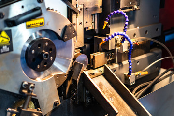 worker cutting steel
