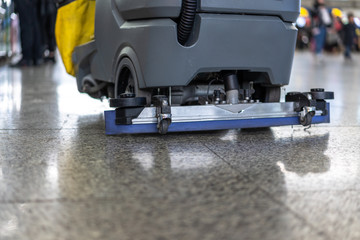 washing floor with machine