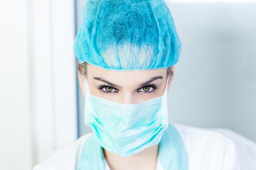 female doctor in medical mask