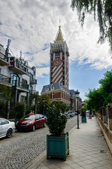 Fototapeta na wymiar BATUMI, ADJARA, GEORGIA - JUNE 26: Clock Tower on June 26, 2016 in Batumi. Clock Tower is located on Piazza Square and includes 4-star 16-room Boutique Hotel 