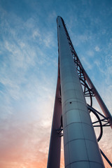 Needle in Glasgow projecting into the sunset