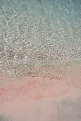 Fototapeta na wymiar Clear sea water ripple background. Elafonisi beach, Crete Island landmark.