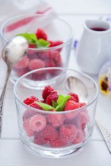 Fresh Organic Raspberries in glasses for Breakfast 