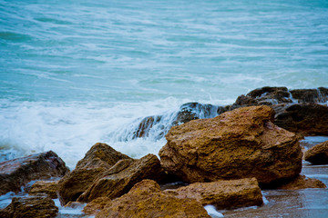 Fototapeta na wymiar Stone Sea shore and waves