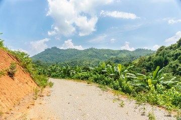 Fototapeta na wymiar Road in the mountains of the province of Xiangkhoang, Laos.