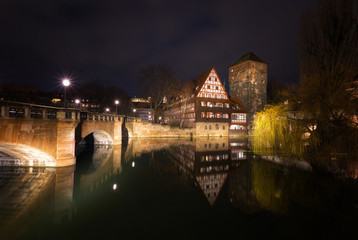 Nuremberg. Bridge over the Pegnitz River and Water tower in night,  Germany
