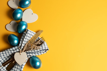 colorful vintage blue easter eggs festival seasoning with yellow backgroun object with heart wood...