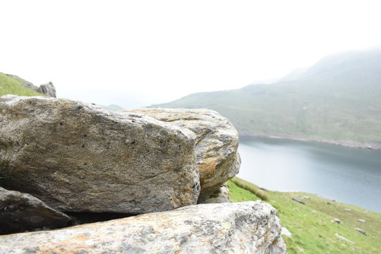 Close up bolders over lake