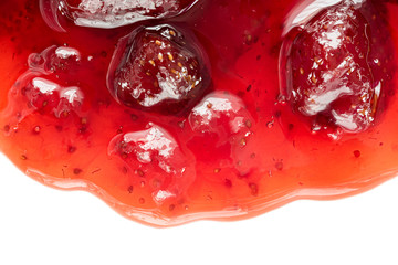 Strawberry jam on white background