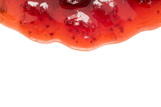 Strawberry jam on white background