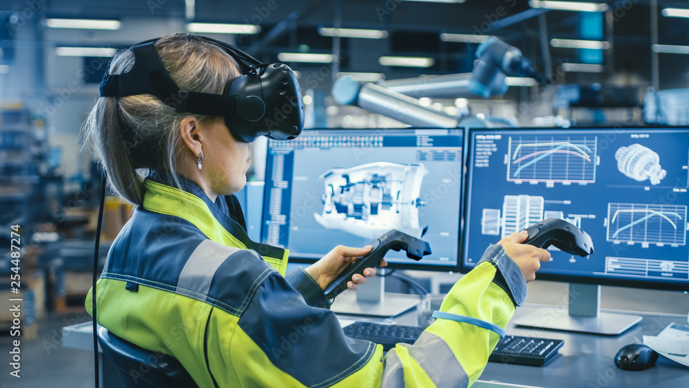 Poster factory: female industrial engineer wearing virtual reality headset and holding controllers, she use