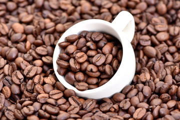 Coffee beans. Beans in a coffee grinder. Hot drink.