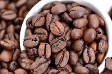 Coffee beans. Beans in a coffee grinder. Hot drink.