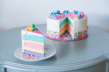 Rainbow layered cake with sprinkles