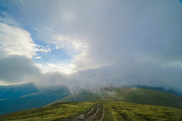 Rain clouds above Carpathians. Panorama of Borzhava ridge of the Ukrainian Carpathian Mountains