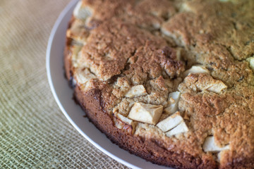 Homemade Healthy Vegan Oat apple pie pastry on burlap surface. Very Healthy Dessert concept.