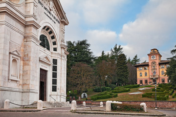 Fototapeta na wymiar Predappio, Emilia-Romagna, Italy: the church and the ancient city hall Palazzo Varano, where he Lived Benito Mussolini