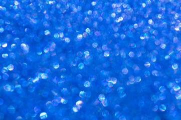Blue glitter texture christmas abstract background. Shiny wrapping paper texture, greeting card design element.