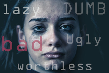 Fototapeta na wymiar Portrait of intimidated, unhappy young girl crying helpless and depressed. Stop bullying campaign