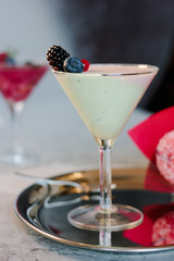 Sweet mousse dessert with berries in a glass