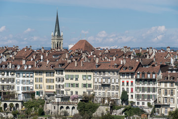 Fototapeta na wymiar Bern skyline with houses from the old town on a cliff on a sunny day in Switzerland capital city