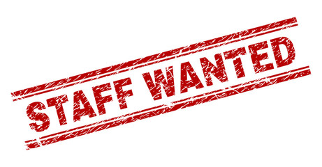 STAFF WANTED seal watermark with corroded texture. Red vector rubber print of STAFF WANTED tag with dust texture. Text tag is placed between double parallel lines.