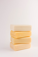 Stack of soap bars isolated on white background
