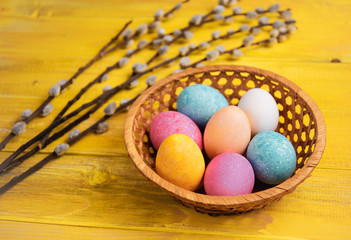 Fototapeta na wymiar Easter eggs on rustic wooden background