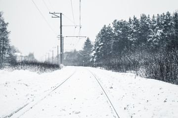 Winter landscape with an empty railway