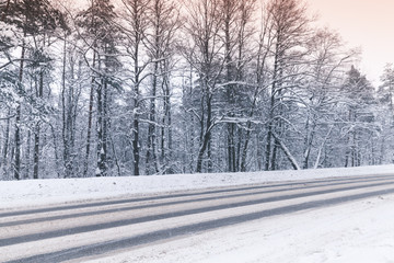 Winter landscape with an empty highway