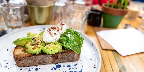 Toast with Avocado and Poached Egg, perfect and healthy breakfast