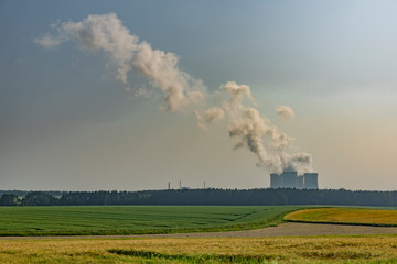 Fototapeta na wymiar Nuclear powerplant near Temelin village in summer hot cloudy day
