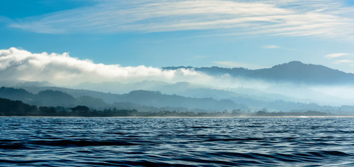 Coastal fog and clouds on the water in Halfmoon Bay, California