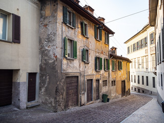 shabby medieval houses in Lower City of Bergamo
