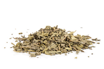 Lot of pieces of dry green tea heap isolated on white background