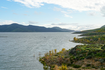 Fototapeta na wymiar Diamond Valley Lake during cloud day. One of the largest reservoirs in Southern California. USA. 