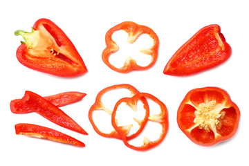 cut slices of red sweet bell pepper isolated on white background top view