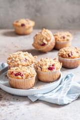 Fresh homemade delicious raspberry muffins on a table