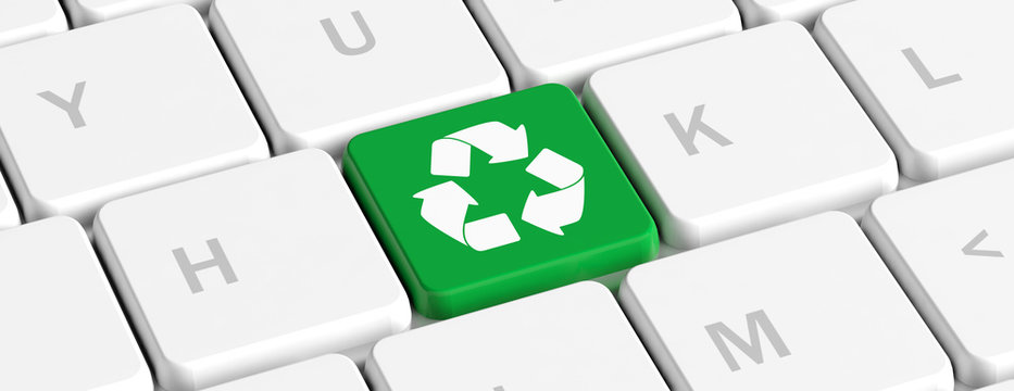 Recycling. Green key button with recycle sign on a computer keyboard, banner. 3d illustration