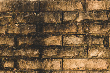Old sand stone brick wall.