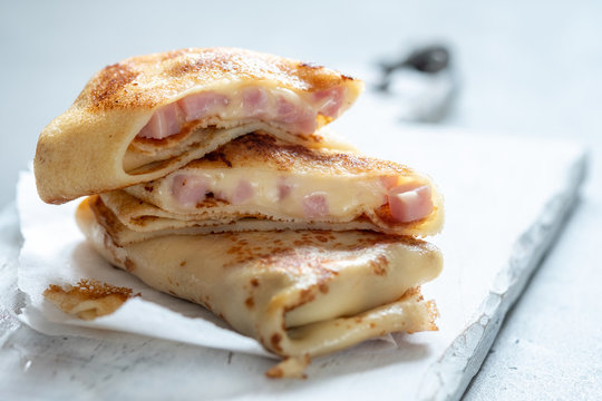 Fried Rolled Crepes with ham and cheese