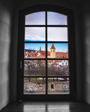 clear glass door panel with brown frame