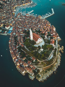 aerial shot of houses near body of water