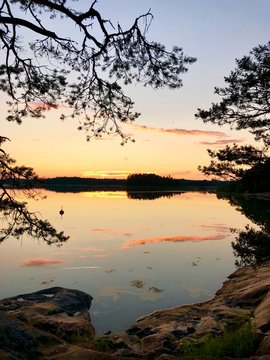body of water with trees on sides