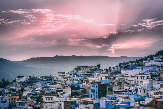 Blue and white houses in a hill