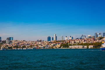 Obraz premium Panorama of the city of Istanbul from the Golden Horn bay on the slopes of the city.
