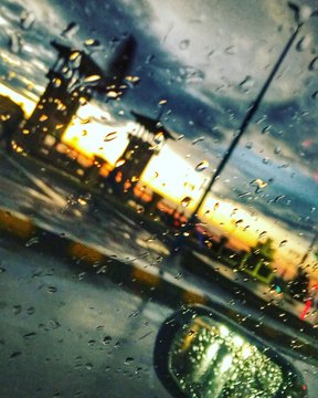 vehicle window with water droplets
