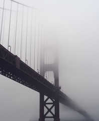 Heavy morning fog surrounds the Golden Gate Bridge