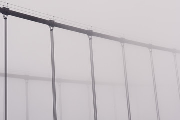 Heavy morning fog surrounds the Golden Gate Bridge
