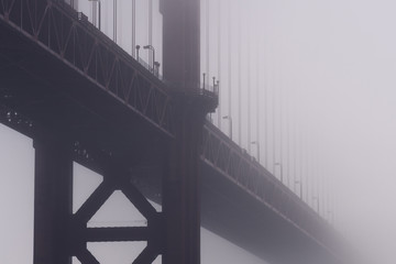 Heavy morning fog surrounds the Golden Gate Bridge